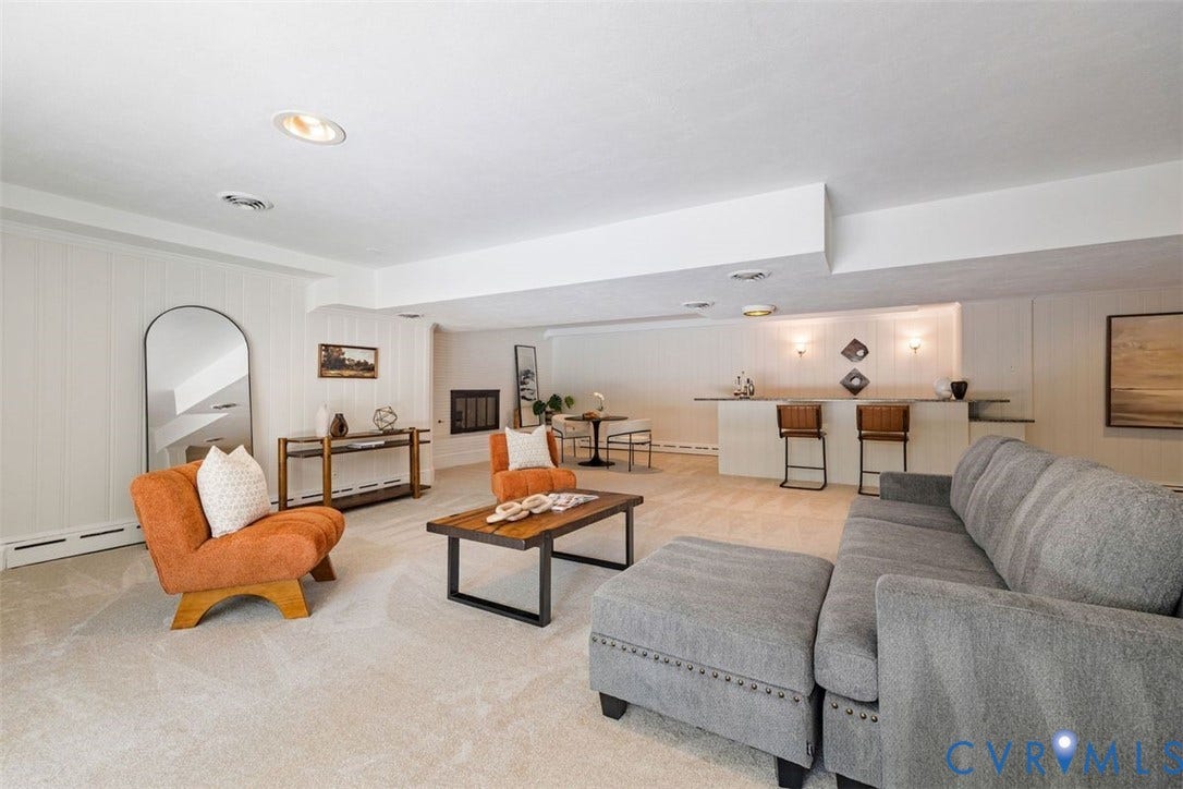 6805 River Road, Westham Ridge, Henrico, VA 23229 The full walk out basement boasts nearly 1,000 SF of entertaining space with a lounge, wet bar and fireplace.