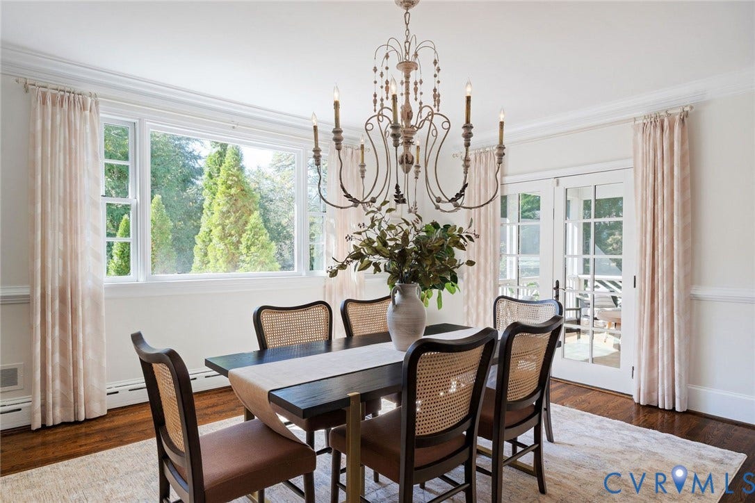 6805 River Road, Westham Ridge, Henrico, VA 23229 Chic chandelier and window dressings frame the original moldings, hardwoods and abundance of natural light.