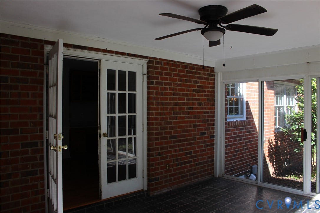 4101 Vauxhall, Chesterfield, VA 23234 Covered patio featuring exposed brick walls, tile flooring, multi-pane glass doors, and a ceiling fan