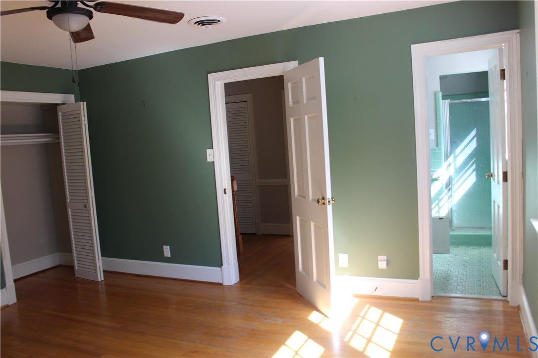 4101 Vauxhall, Chesterfield, VA 23234 Interior room featuring wood-finish flooring, louvered-style closet doors, solid-core panel doors, and an attached ceiling fan with integrated lighting