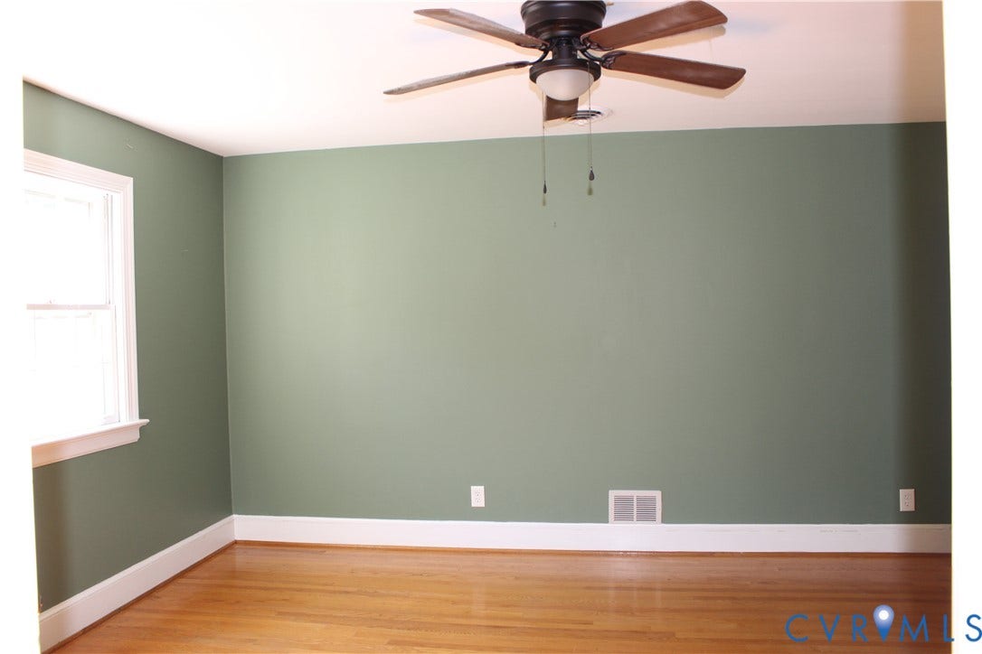 4101 Vauxhall, Chesterfield, VA 23234 Room featuring wood-finish flooring, a multi-blade ceiling fan with integrated lighting, and a single-pane window