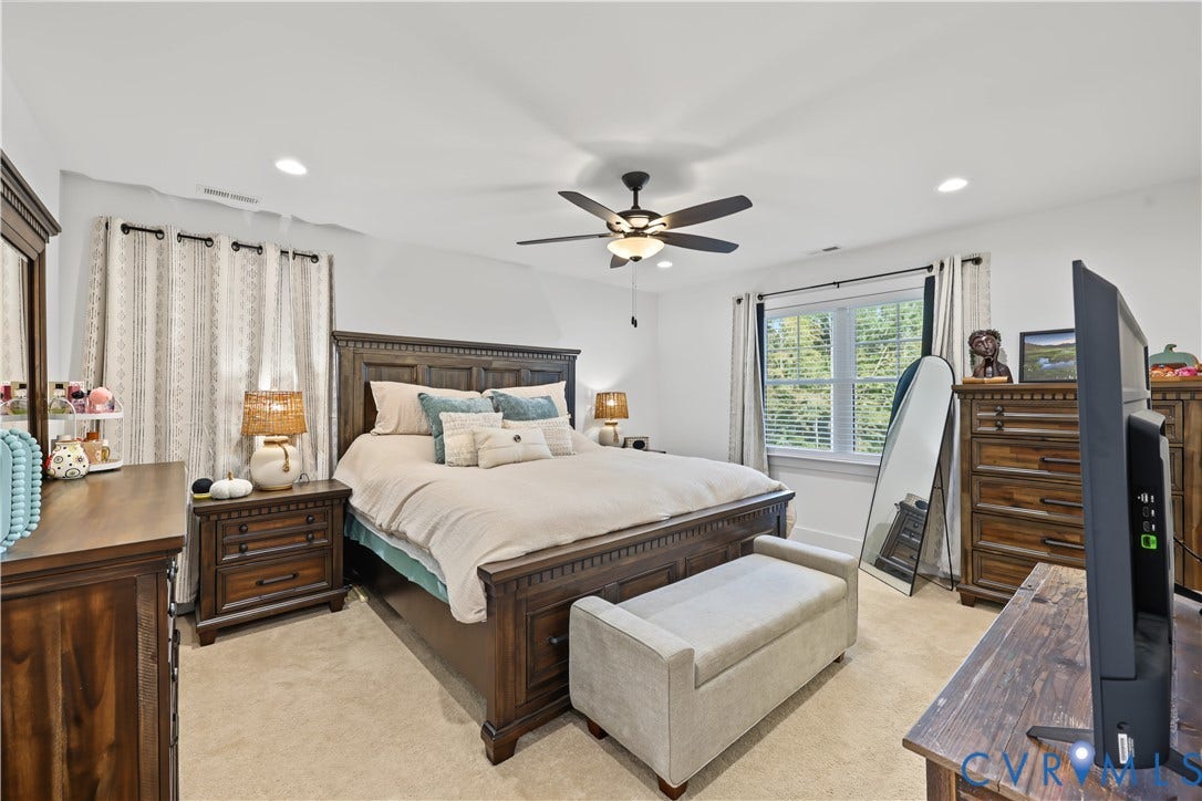 3851 County Line Road, Flemings Mill, Goochland, VA 23084 Neutral-toned wall-to-wall carpeting, recessed ceiling lighting, and a multi-blade ceiling fan with a centered light fixture