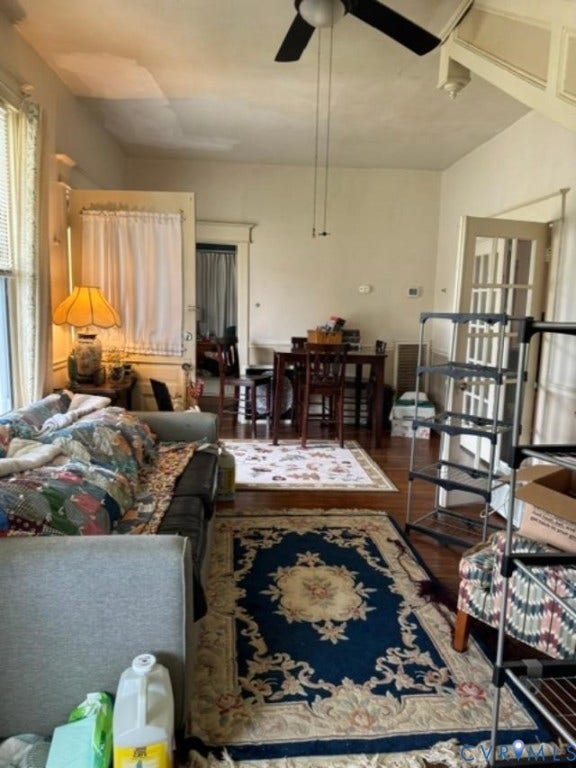 18194 S. Railroad Avenue, Boykins, VA 23827 Interior space featuring wood-finish flooring, a ceiling-mounted fan, and a multi-pane glass-panel door