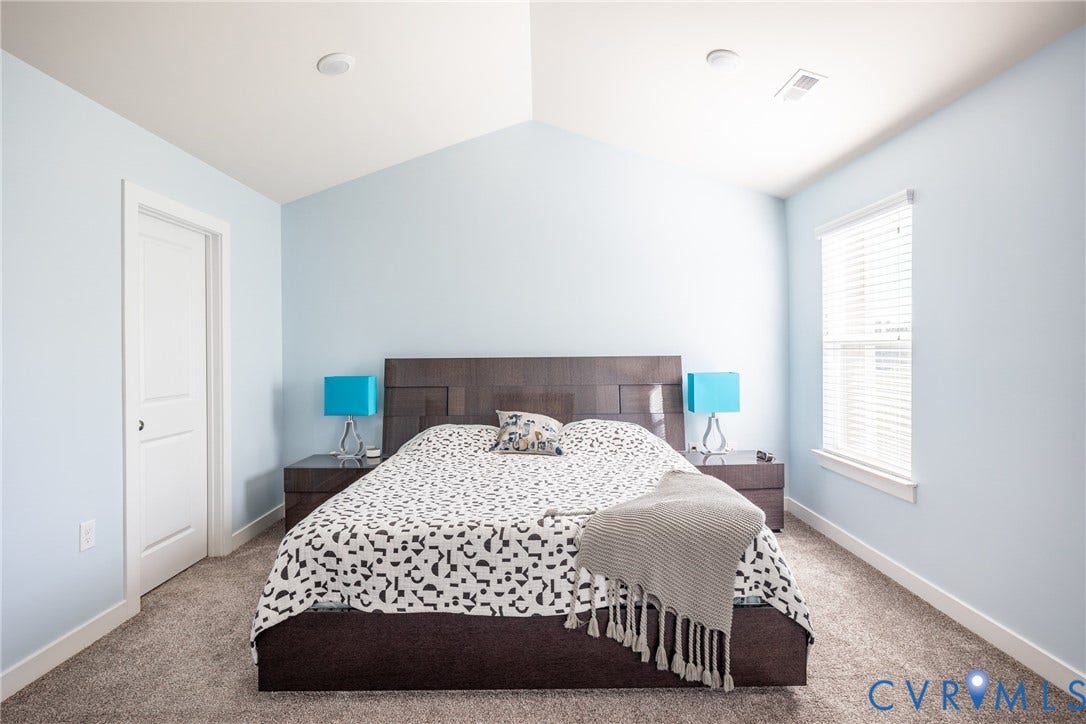 12548 Petrel Crossing, Midlothian, VA 23112 Neutral interior featuring wall-to-wall carpeting, double-panel closet doors, and a ceiling-mounted flush light fixture