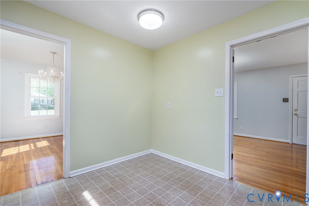 9329 Totopotomoy Trail, Ashland, VA 23005 Interior space featuring grid-pattern tile flooring and a flush-mount overhead light fixture