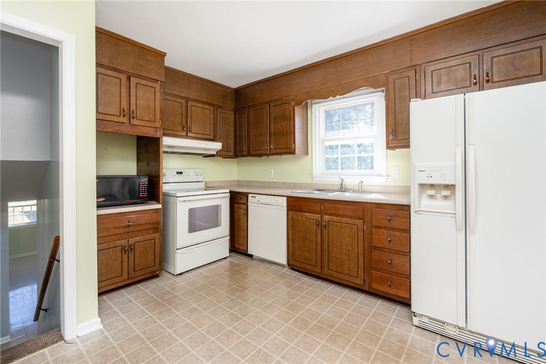 9329 Totopotomoy Trail, Ashland, VA 23005 Kitchen featuring natural wood cabinetry, solid surface countertops, and tiled flooring