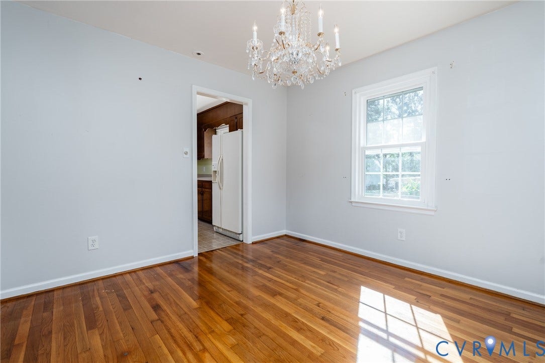 9329 Totopotomoy Trail, Ashland, VA 23005 Hardwood flooring, crystal chandelier, and multi-pane window