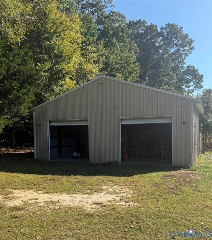 26691 Bell Road, Amelia, VA 23002 Detached metal-sided structure featuring two garage bays and exterior lighting