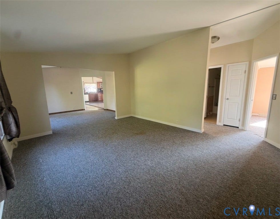 26691 Bell Road, Amelia, VA 23002 Vaulted ceilings, neutral wall tones, and carpeted flooring