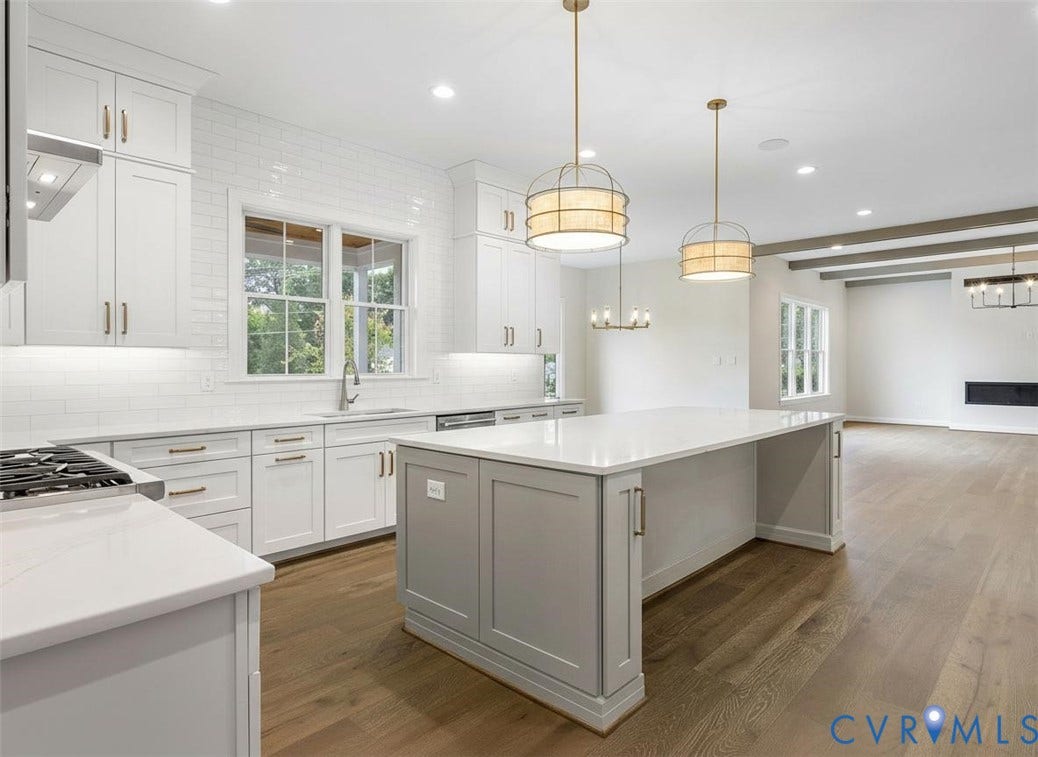 2851 Old Pump Road, Preserve At John Rolfe, Henrico, VA 23233 Kitchen featuring white shaker-style cabinetry, a quartz-topped center island, white subway tile backsplash, drum pendant lighting, and wood-finish flooring
