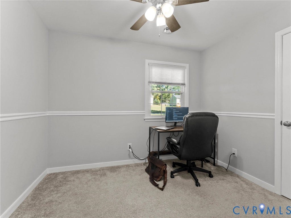 8708 Rainwater Road, Huntingcreek Hills, North Chesterfield, VA 23237 Neutral wall color featuring chair rail molding, wall-to-wall carpeting, single-hung window, and a ceiling-mounted fan with light fixture
