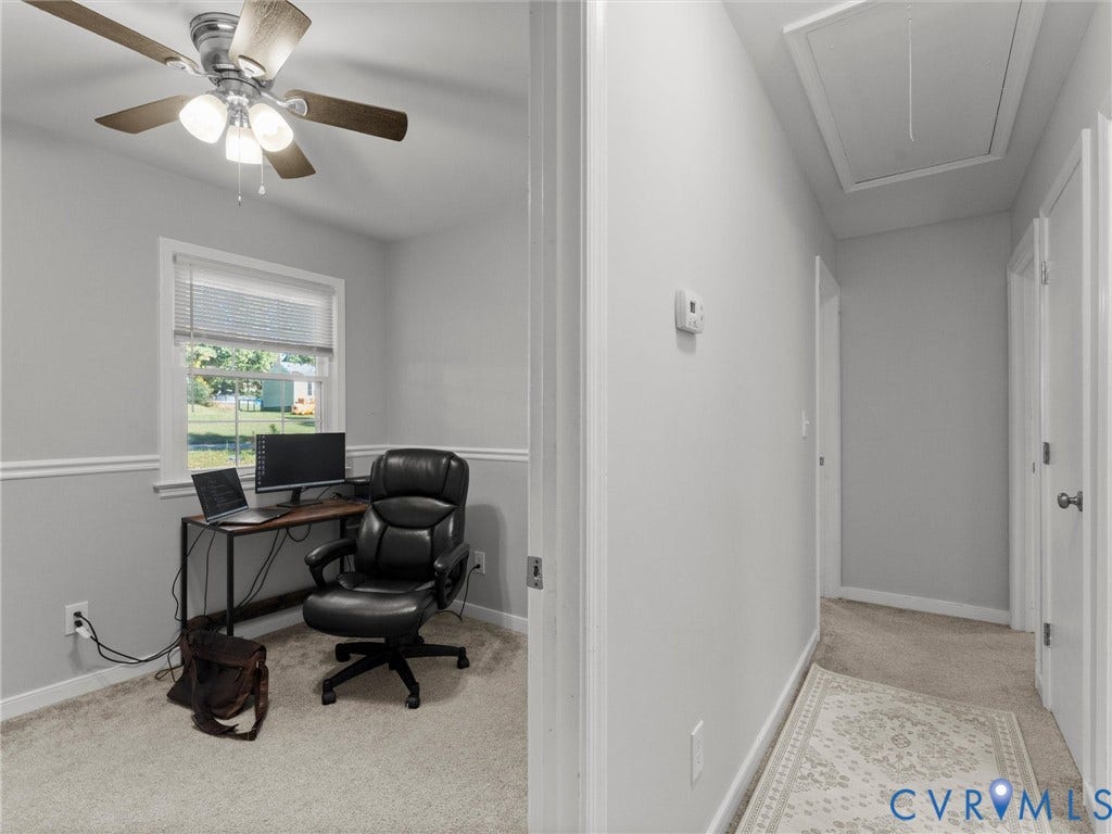 8708 Rainwater Road, Huntingcreek Hills, North Chesterfield, VA 23237 Room featuring a ceiling fan with integrated lighting, neutral wall-to-wall carpeting, wainscoting, and a window with blinds
