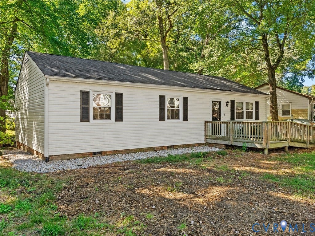 8708 Rainwater Road, Huntingcreek Hills, North Chesterfield, VA 23237 Exterior featuring white vinyl siding, dark shutters, an asphalt shingle roof, and a wooden deck with a built-in ramp