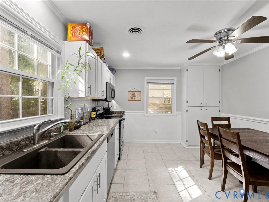 8708 Rainwater Road, Huntingcreek Hills, North Chesterfield, VA 23237 Kitchen featuring white cabinetry, stone-finish countertops, subway tile backsplash, ceramic tile flooring, and integrated ceiling fan with lighting
