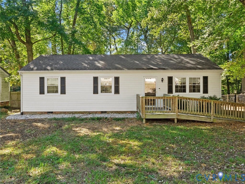 8708 Rainwater Road, Huntingcreek Hills, North Chesterfield, VA 23237 Single-story exterior featuring white vinyl siding, dark shutters, a gabled roofline, and a wood-deck ramp