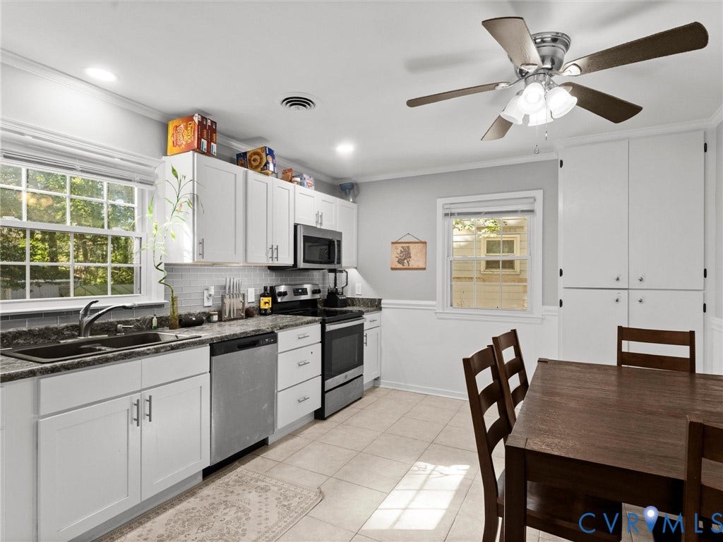 8708 Rainwater Road, Huntingcreek Hills, North Chesterfield, VA 23237 Kitchen featuring white cabinetry, stone-finish countertops, stainless steel appliances, tile flooring, and a ceiling fan with integrated lighting