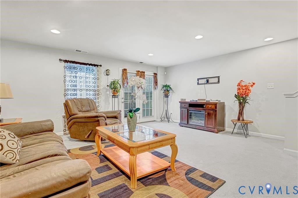 11600 Vicars Ridge Lane, Henrico, VA 23059 Living room featuring light carpet, recessed lighting, visible vents, and baseboards