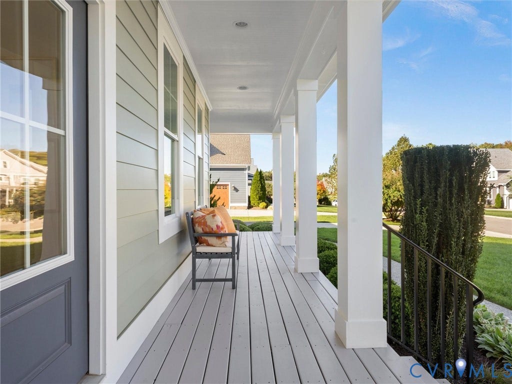 1412 Ascot Hill Terrace, Midlothian, VA 23112 Covered front porch featuring light grey horizontal lap siding, square structural columns, painted wooden decking, and a metal handrail