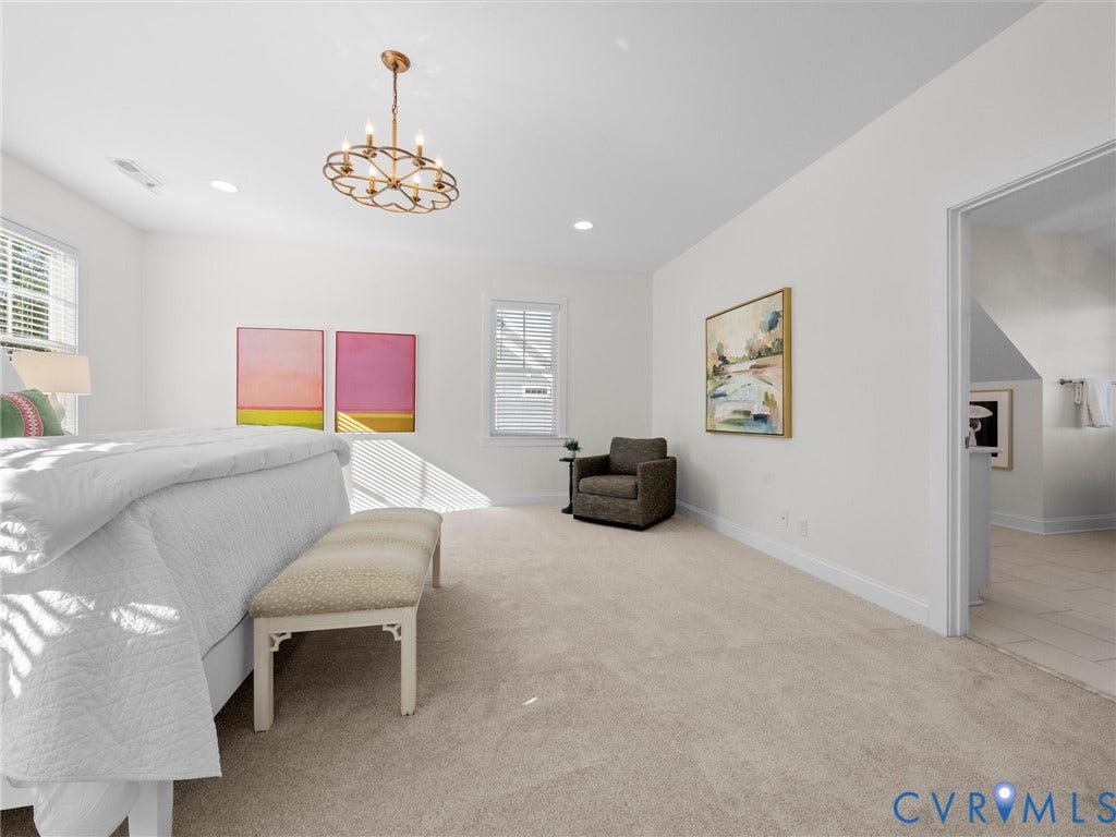 1412 Ascot Hill Terrace, Midlothian, VA 23112 Neutral-toned carpeting, multi-light metal chandelier, and windows with integrated blinds