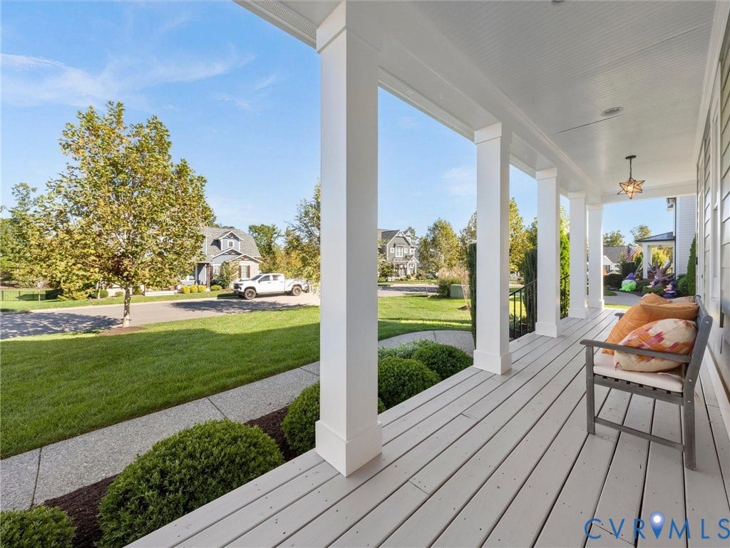 1412 Ascot Hill Terrace, Midlothian, VA 23112 Covered front porch featuring white square columns, tongue-and-groove ceiling, painted wood-finish decking, and pendant lighting