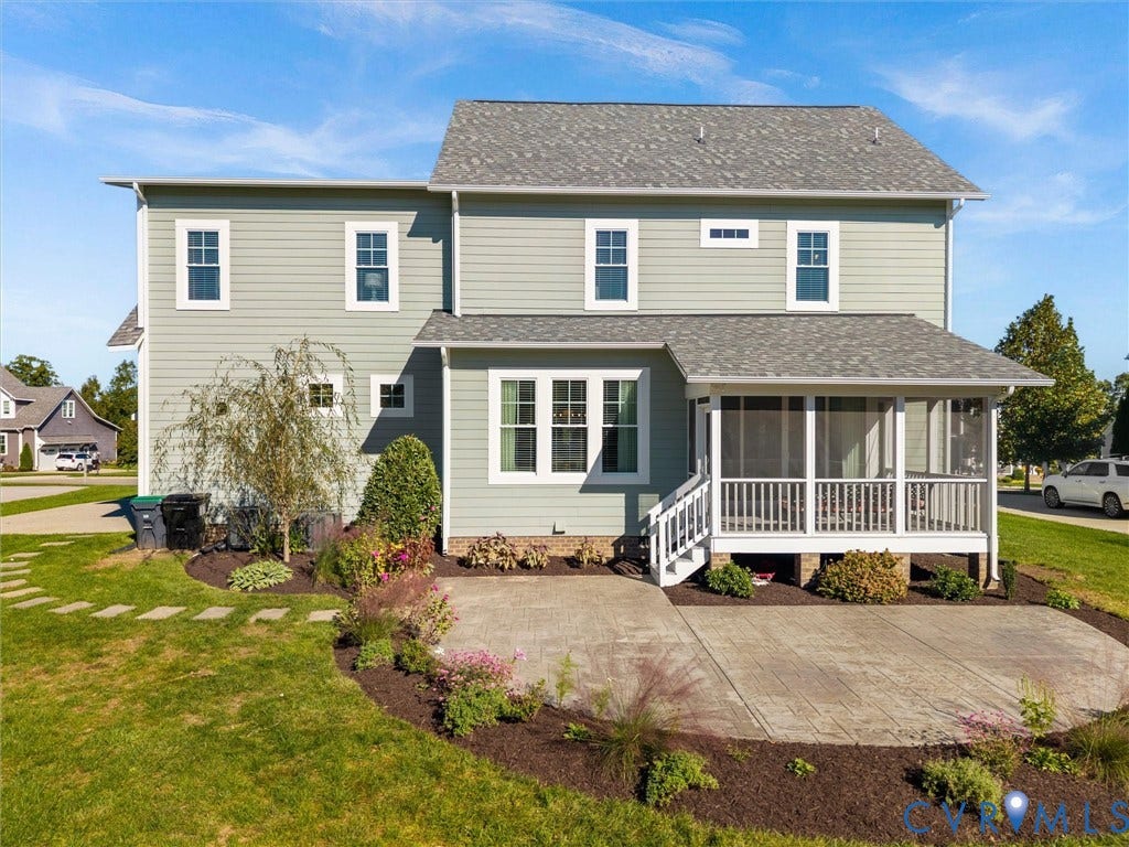 1412 Ascot Hill Terrace, Midlothian, VA 23112 Two-story residence featuring light green horizontal siding, a screened-in porch with white railings, and a stamped concrete patio