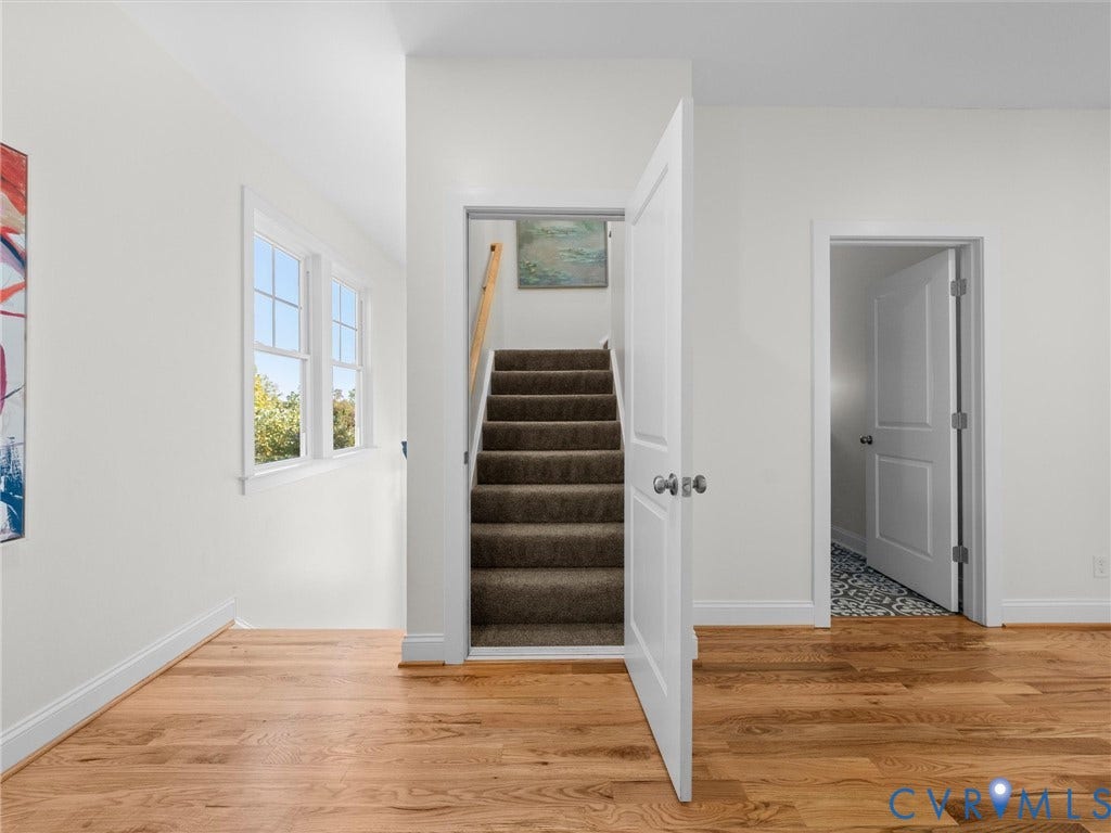 1412 Ascot Hill Terrace, Midlothian, VA 23112 Wood-finish flooring, double-pane windows, carpeted staircase, and multi-panel interior doors