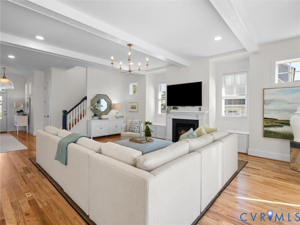 1412 Ascot Hill Terrace, Midlothian, VA 23112 Living area featuring wood-finish flooring, recessed lighting, exposed ceiling beams, a fireplace with a mantel, and a dedicated built-in window bench