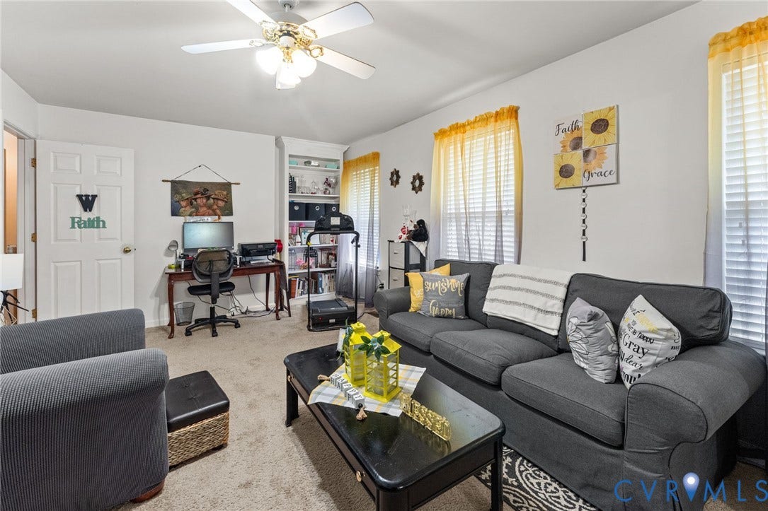 17030 Courtney Road, Reedy Church District, Hanover, VA 23069 Room interior featuring wall-to-wall carpeting, built-in shelving, and a ceiling-mounted light fixture with a fan