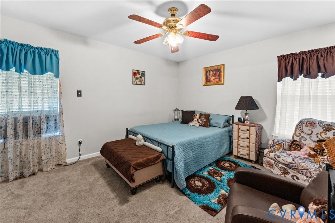 17030 Courtney Road, Reedy Church District, Hanover, VA 23069 Neutral wall coloring, wall-to-wall carpeting, and a ceiling-mounted light fixture with a multi-blade fan