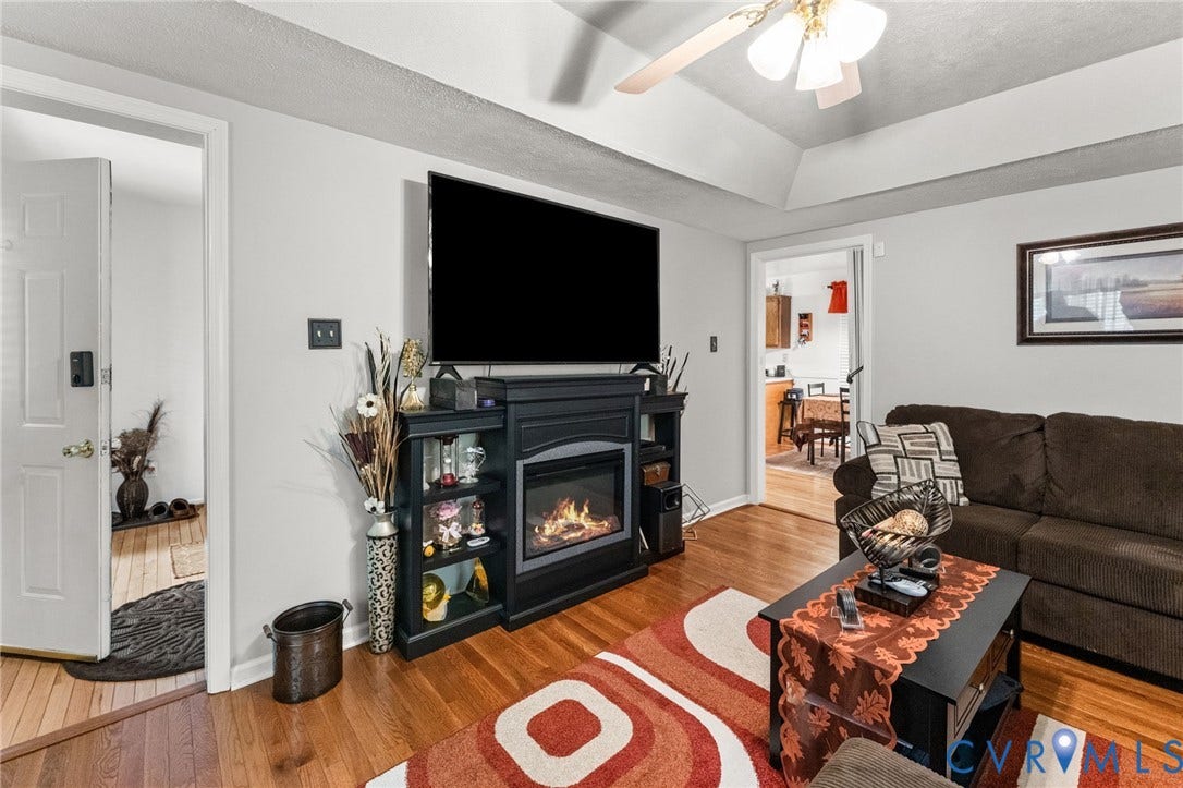 17030 Courtney Road, Reedy Church District, Hanover, VA 23069 Tray ceiling, wood-finish flooring, and built-in fireplace mantle with integrated shelving