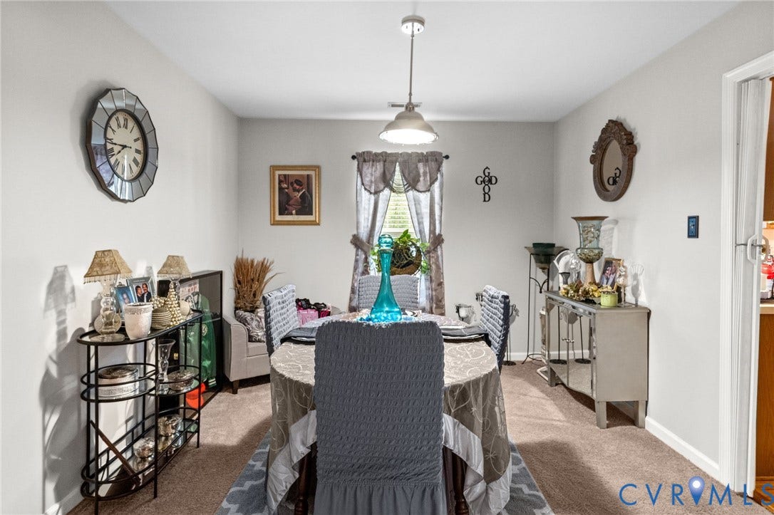 17030 Courtney Road, Reedy Church District, Hanover, VA 23069 Neutral interior space featuring carpeted flooring, a neutral wall palette, and a central dome-style pendant light fixture