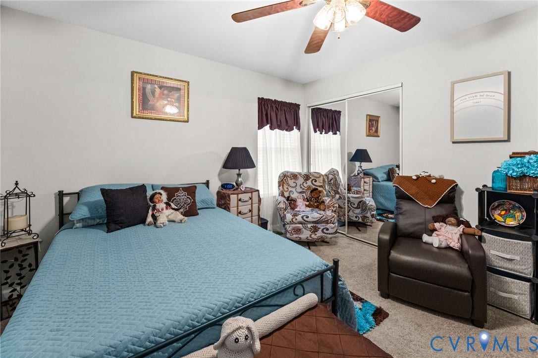 17030 Courtney Road, Reedy Church District, Hanover, VA 23069 Bedroom featuring wall-to-wall carpeting, dual-pane windows, a sliding mirrored closet door, and an attached multi-light ceiling fan