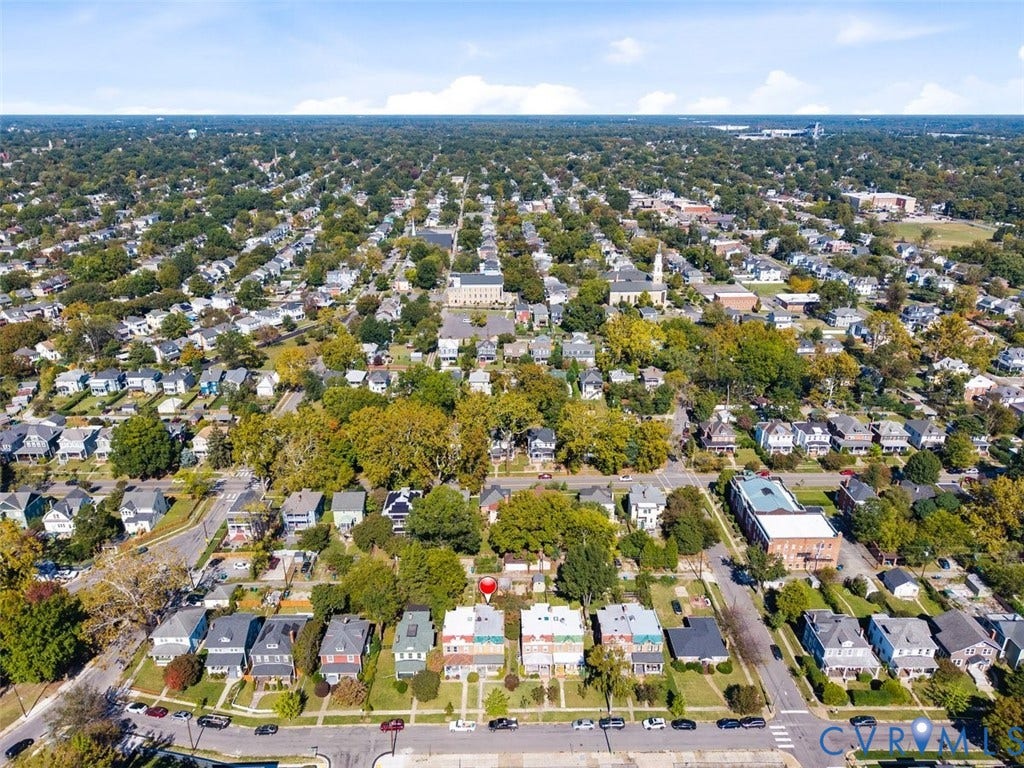 210 W Graham Road, Richmond, VA 23222 Aerial perspective of a detached residential property featuring a rectangular lot, mature trees, and street-front access