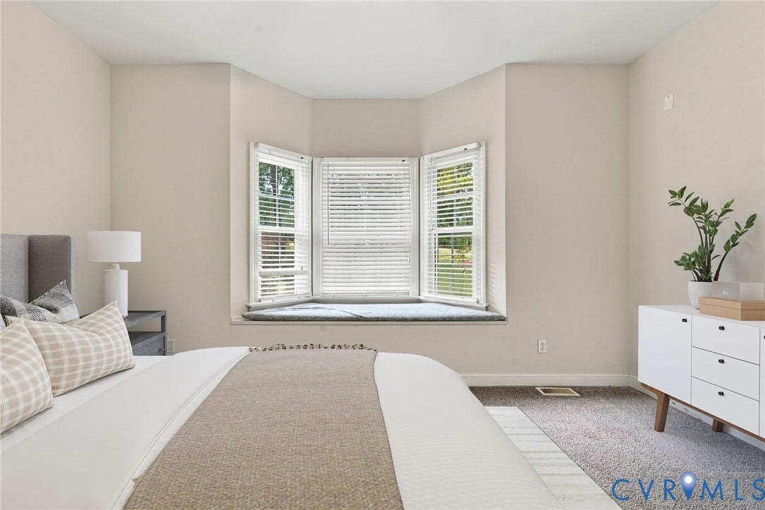 2654 Academy Road, Powhatan, VA 23139 Bay window featuring a built-in bench seat and neutral carpeting. Virtually staged concept