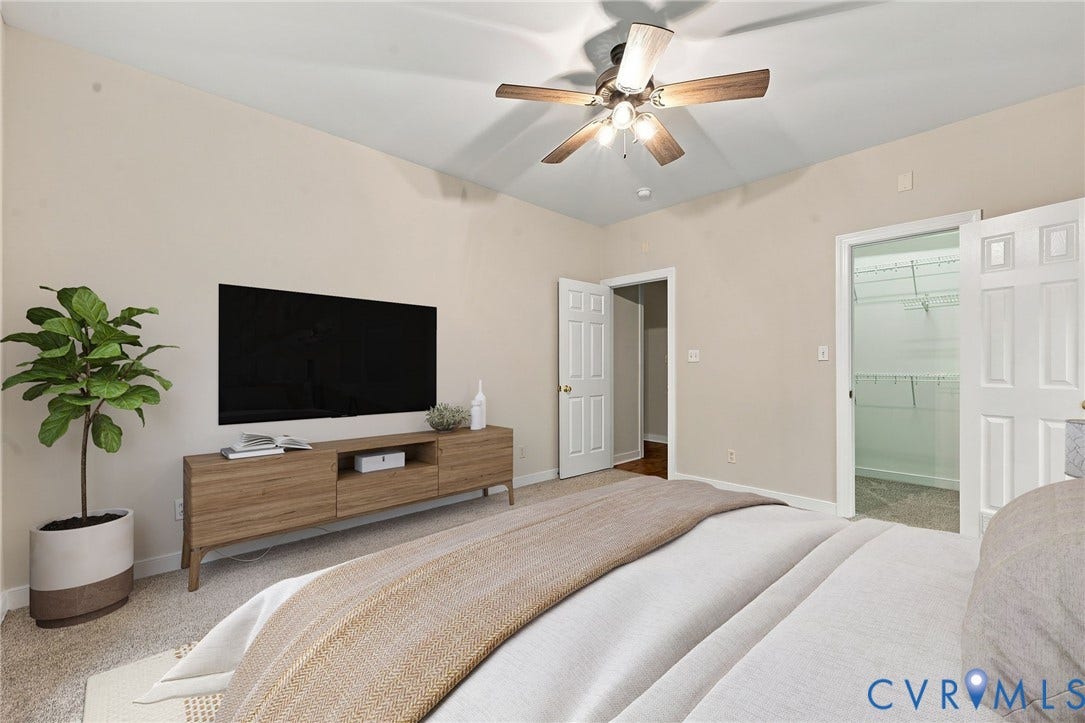 2654 Academy Road, Powhatan, VA 23139 Guest bedroom with neutral paint and ceiling fan. Virtually staged concept