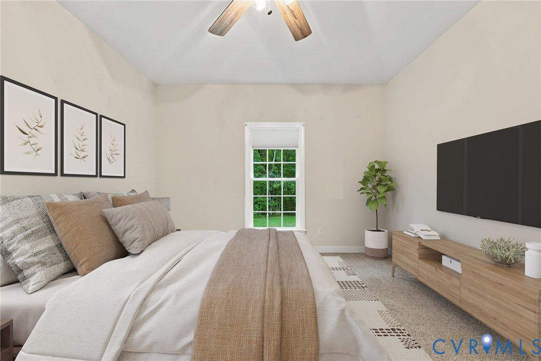 2654 Academy Road, Powhatan, VA 23139 Guest bedroom with neutral paint and ceiling fan. Virtually staged concept