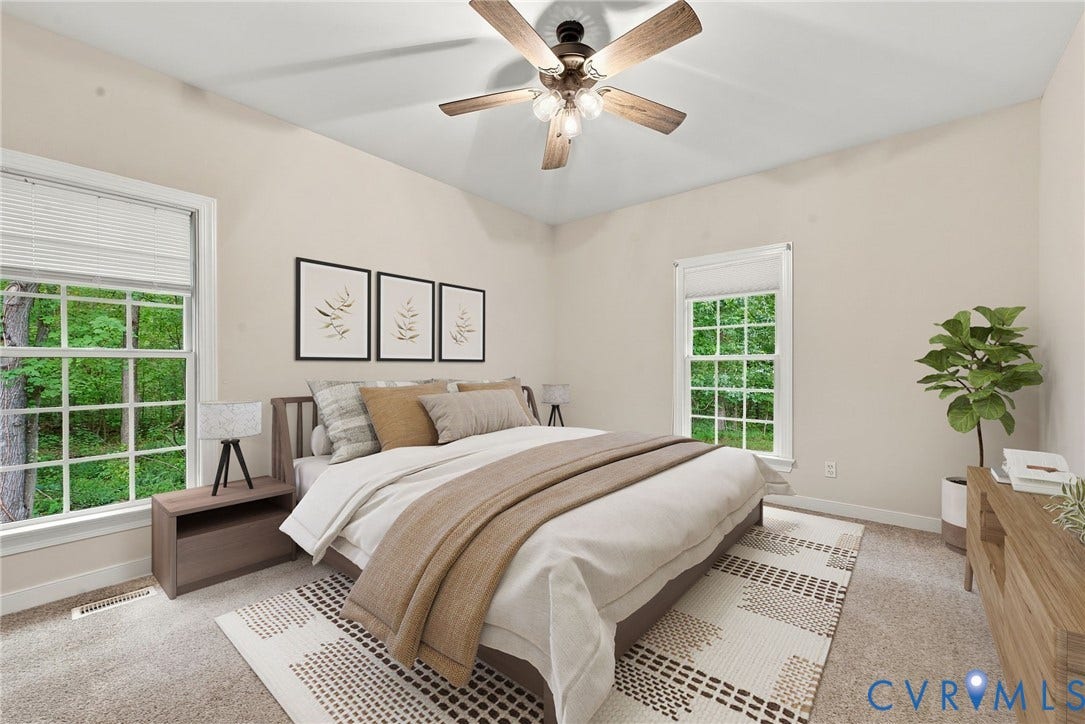 2654 Academy Road, Powhatan, VA 23139 Guest bedroom with neutral paint and ceiling fan. Virtually staged concept