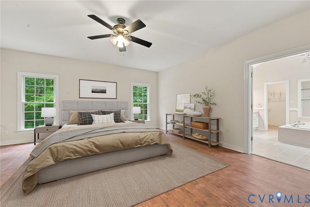 2654 Academy Road, Powhatan, VA 23139 Primary bedroom with LVP floors. Virtually staged concept