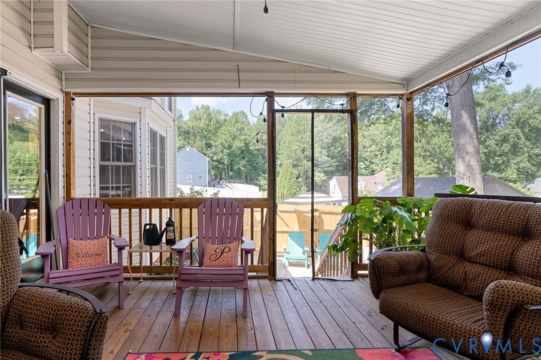 4427 Tweedsmuir Court, Midlothian, VA 23120 Screened porch featuring a wood-plank floor, vaulted ceiling, and wooden railing