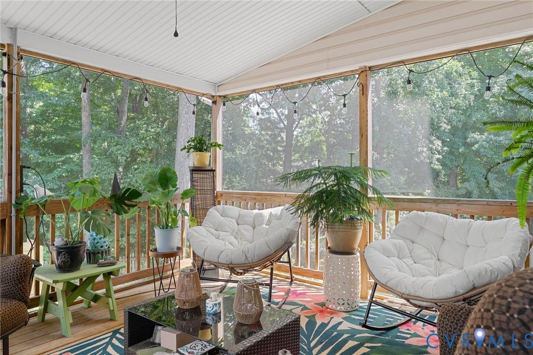 4427 Tweedsmuir Court, Midlothian, VA 23120 Screened-in porch featuring wood-plank flooring, wood railing, and a vaulted ceiling