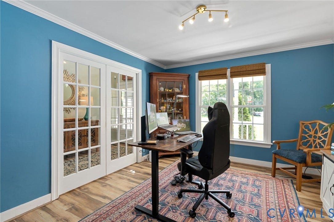 4427 Tweedsmuir Court, Midlothian, VA 23120 French-style double doors with glass panes, wood-finish flooring, multi-light ceiling fixture, and double windows with woven wood shades