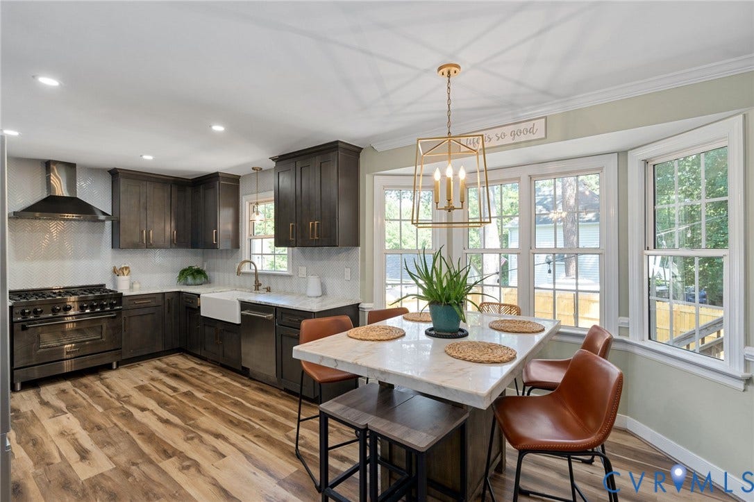 4427 Tweedsmuir Court, Midlothian, VA 23120 Kitchen featuring dark wood-finish cabinetry, stone countertops, farmhouse-style sink, stainless steel professional-grade range with matching hood, and wood-finish flooring