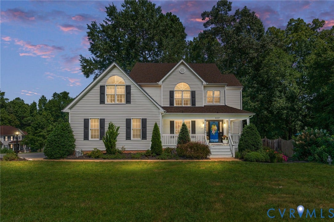 4427 Tweedsmuir Court, Midlothian, VA 23120 Two-story exterior featuring horizontal siding, dark window shutters, arched windows, and a covered front porch with white railing