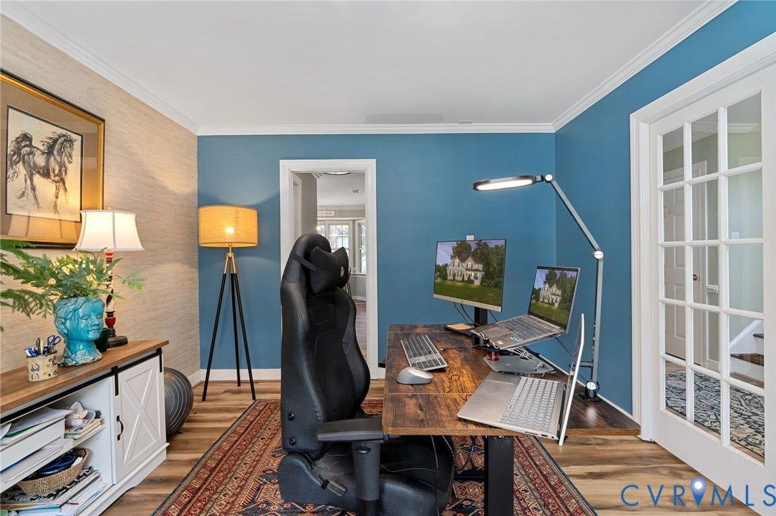 4427 Tweedsmuir Court, Midlothian, VA 23120 Wood-finish flooring, textured accent wall, and glass-paned French doors