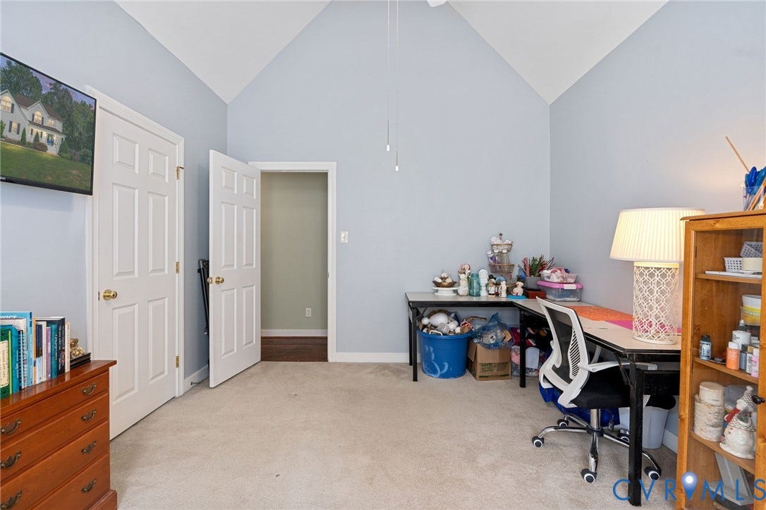 4427 Tweedsmuir Court, Midlothian, VA 23120 Vaulted ceiling, neutral wall tones, six-panel interior doors, and carpeted flooring