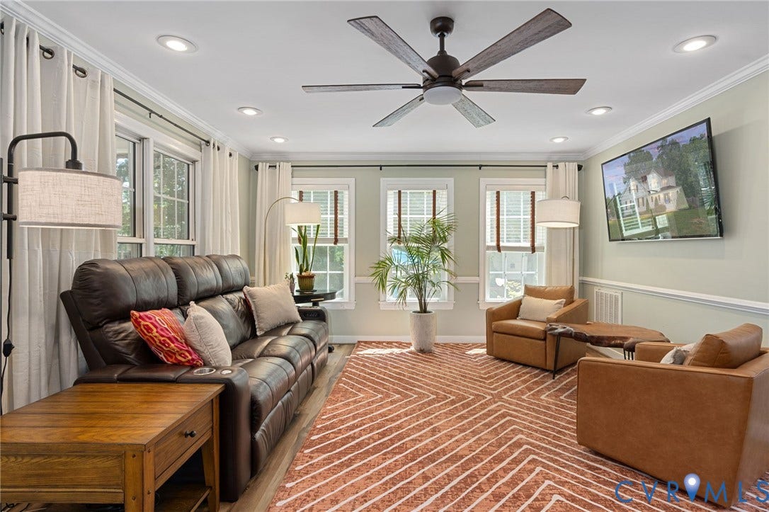 4427 Tweedsmuir Court, Midlothian, VA 23120 Living room featuring crown molding, chair rail trim, recessed lighting, multi-blade ceiling fan, and triple windows