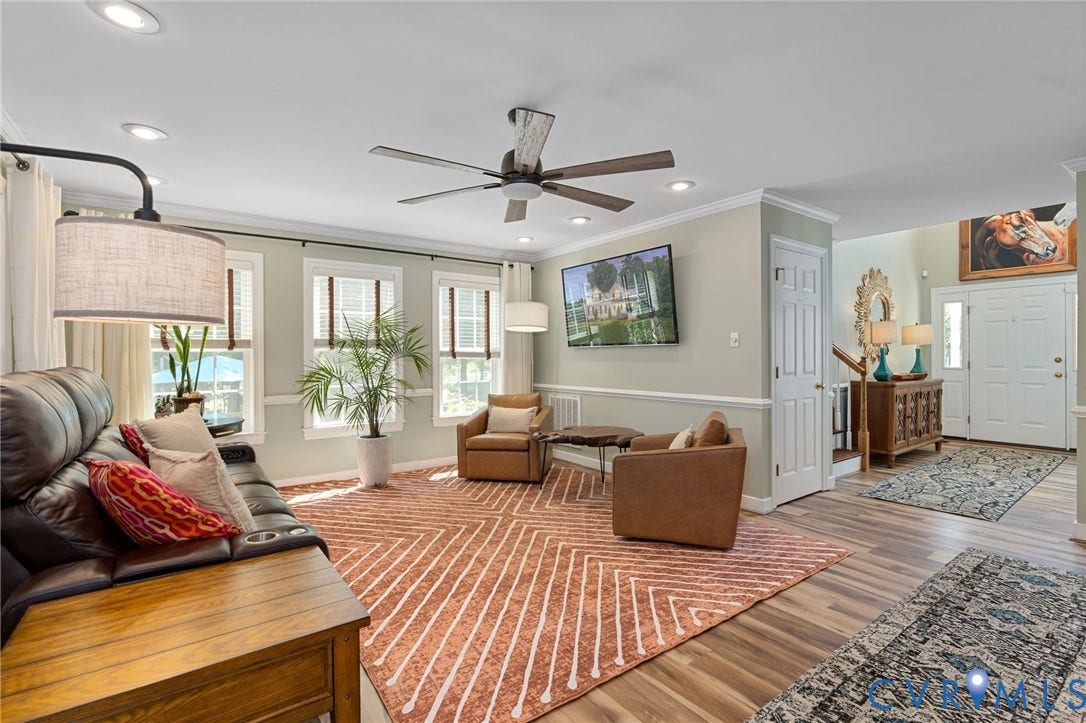 4427 Tweedsmuir Court, Midlothian, VA 23120 Living area featuring wood-finish flooring, recessed lighting, crown molding, chair rail trim, and a ceiling fan
