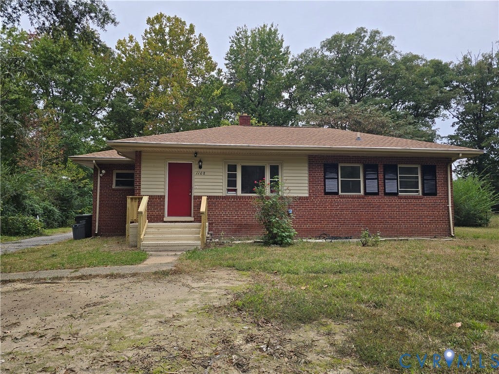 1108 Pierpont Road, Richmond, VA 23225 Single-story brick and siding exterior featuring a covered front entry with stairs, a bold red front door, and black window shutters