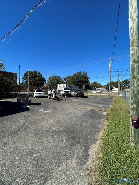 3300 Hull Street, Richmond, VA 23224 Asphalt paved surface with chain-link perimeter fencing