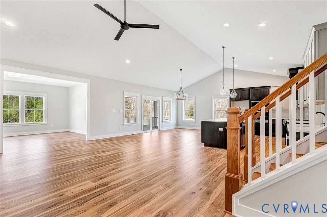 8860 Emily Jane Place, Quinton, VA 23141 The property features hardwood floors, a vaulted ceiling, and recessed lighting